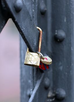 Love lock pending at a bridge in Hamburg