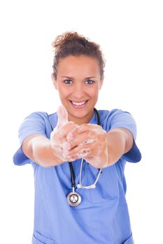 young nurse washing hands with soap isolated