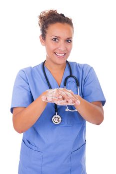 young nurse washing hands with soap isolated