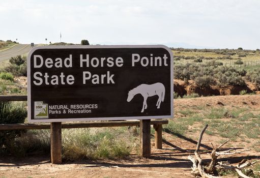 Entrance sign at Dead Horse Point State Park in Moab, Utah, USA. Location is near Canyonlands and Arches National Parks; 