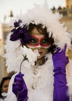 VENICE, ITALY - FEBRUARY 27: Participant in The Carnival, an annual festival that starts around two weeks before Ash Wednesday and ends on Shrove Tuesday or Mardi Gras on February 27, 2011 in Venice, Italy