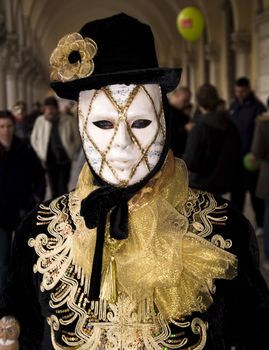 VENICE, ITALY - FEBRUARY 27: Participant in The Carnival, an annual festival that starts around two weeks before Ash Wednesday and ends on Shrove Tuesday or Mardi Gras on February 27, 2011 in Venice, Italy
