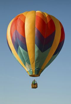 Hot-air balloon against a blue sky