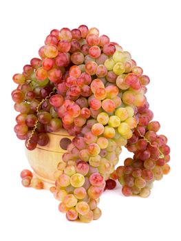 Heap of Ripe Pink Sultana Grape in Wooden Bowl isolated on white background