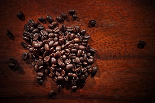 coffee roast bean on wood textured  background