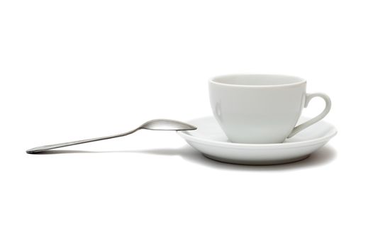 white cup with spoon and saucer isolated on white background