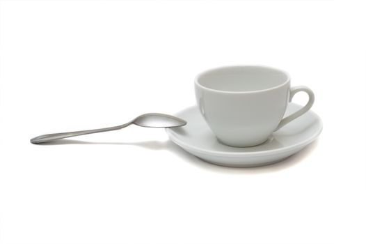 white cup with spoon and saucer isolated on white background