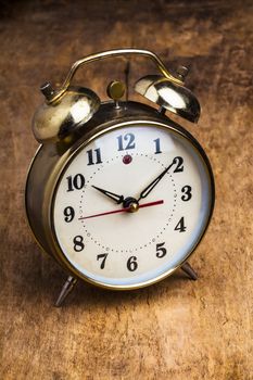 Vintage watch on a wooden board