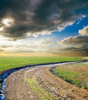 dirty way under dramatic sky