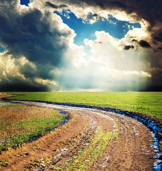 rural way under dramatic sky