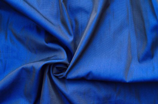 close up of blue silk textured cloth