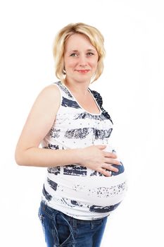 beautiful pregnant woman tenderly holding her tummy isolated on white background