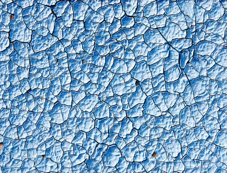 cracked blue paint surface as grunge background