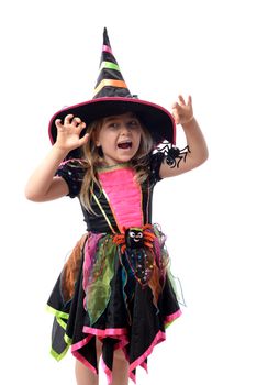 Little girl dressed up as a witch isolated on white