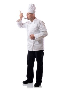 Chef tasting a food sample isolated on white