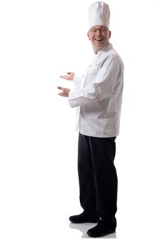 Male chef smiling pointing to a product isolated on white