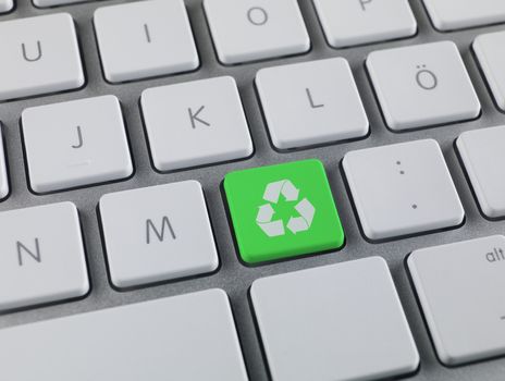Recycling key on a computer keyboard