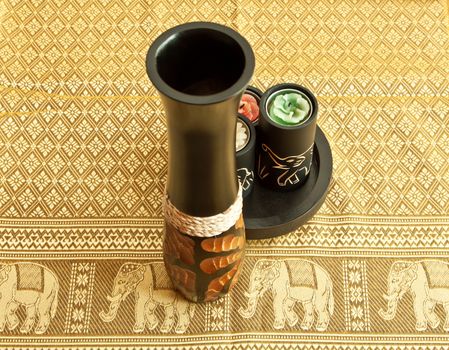 Tablecloth, vase and candles with image of elephants - souvenir from Asia or Africa
