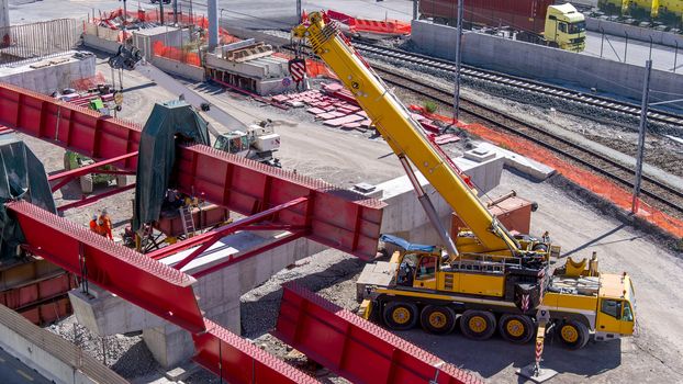 pylon and cross the causeway under construction