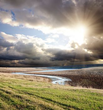 sunset over river