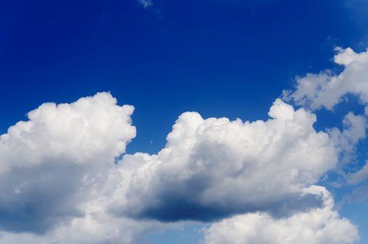 deep blue sky with clouds