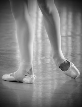 black and white image of ballet dancer's feet