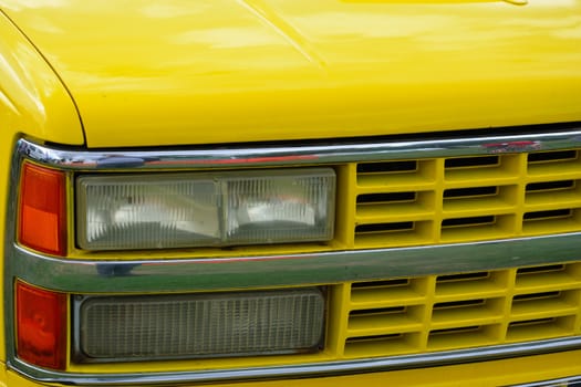 Yellow Front of car with head lights