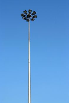 The street lamp tower on blue sky background