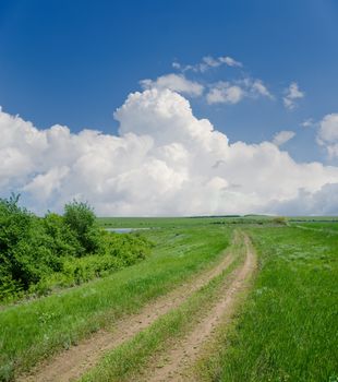 rural road under clouds