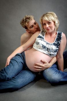 Loving happy couple, pregnant woman in love with her husband, romantic scene