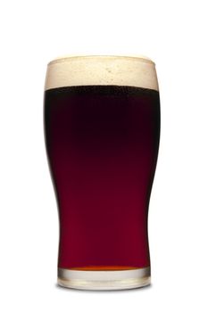 A pint of dark beer isolated on white.