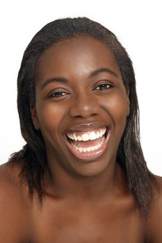 A close-up of a lovely young black woman with bare shoulders.