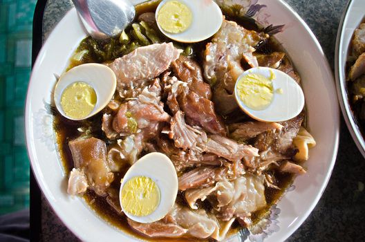 The Leg of Pig Stewed in Gravy with Boiled Eggs,a kind of Chinese dish.