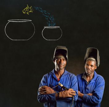 African American black men industrial workers with chalk jumping fish bowls on a blackboard background