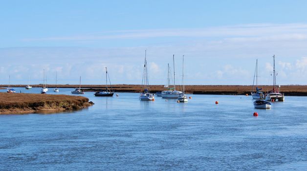 An image of boats on the Norfolk coast in Eastern England.