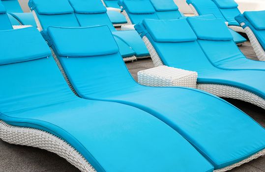 empty beach couches at the beach