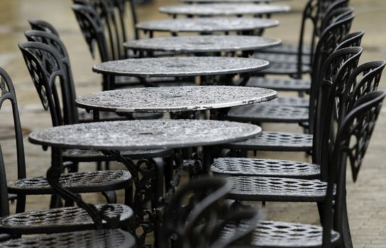 bistro tables on a rainy day