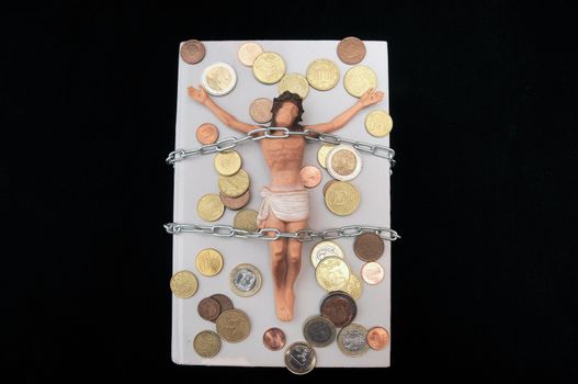 Jesus Christ and Money on a Dark Background - Religion Concept