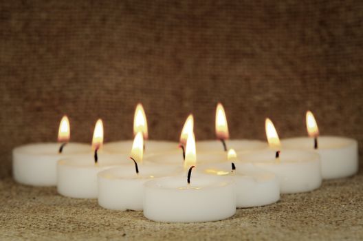 a group of burning candles