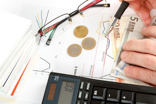 calculator, charts, pen in hand, business cards, money, workplace businessman, business collage