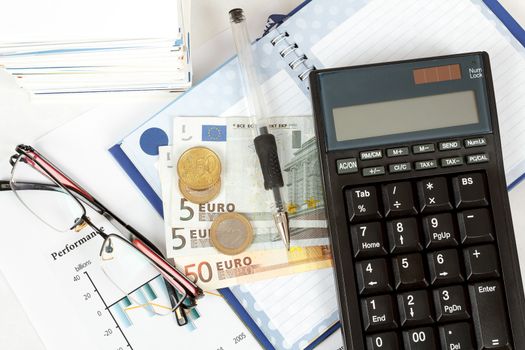 calculator, charts, pen, glass, money, notes,workplace businessman, business collage
