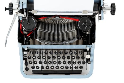 retro uncovered blue typewriter on white background