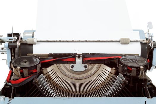 retro typewriter close up with paper and letters mechanism