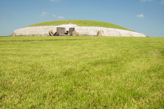Newgrange is a prehistoric monument in Ireland, It was built about 3200 BC during the Neolithic period, which makes it older than Stonehenge and the Egyptian pyramids.