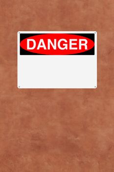 A blank danger sign mounted on a wall