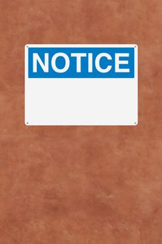 A blank notice sign mounted on a wall