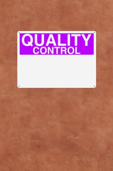 A blank quality control sign mounted on a wall