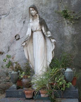 Madonna, virgin over a grave