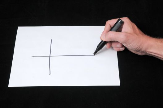 A Caucasian Male Hand Drawing on a White Paper