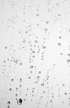 Drops of rain on the window (glass). Shallow DOF.